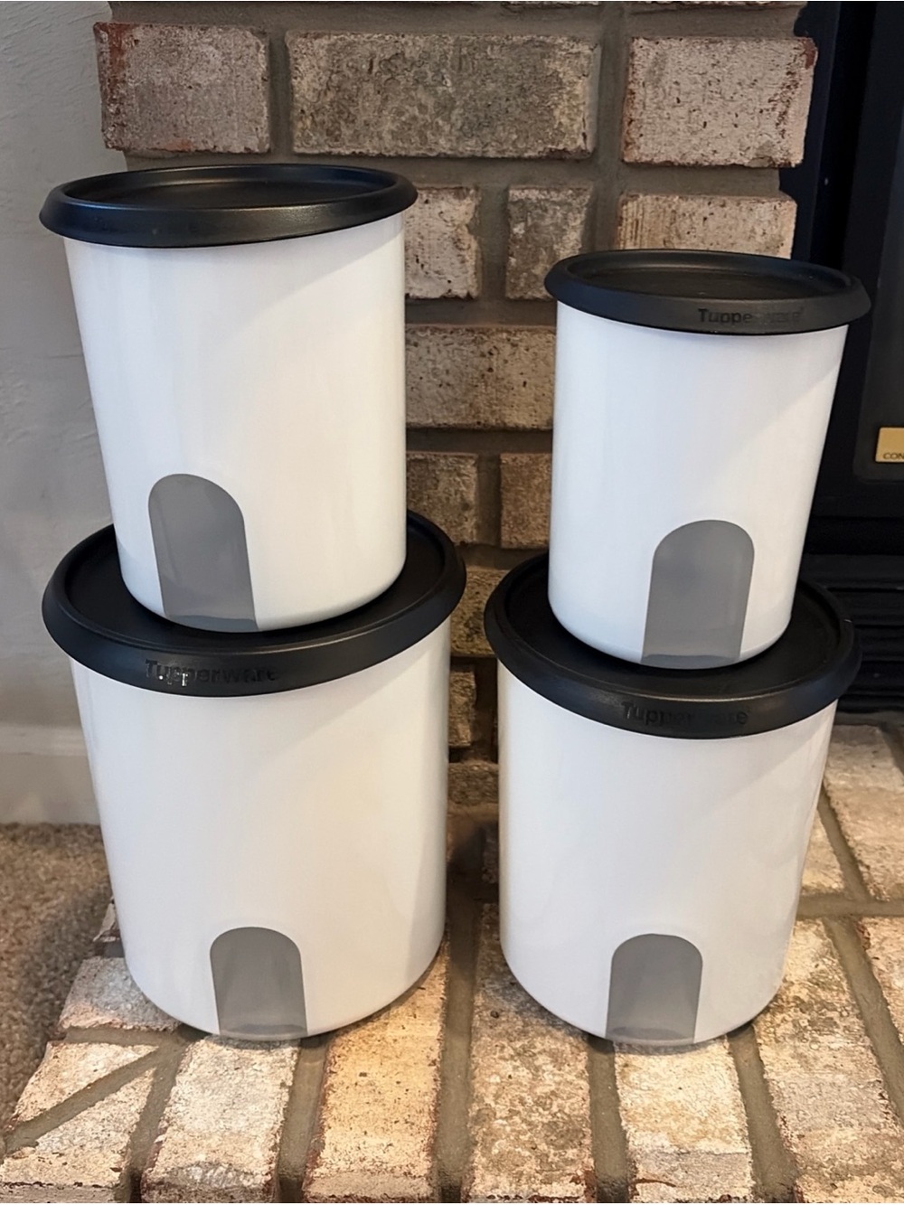 Tupperware 4-Piece Black Canister Set with Innovative Seals for Freshness